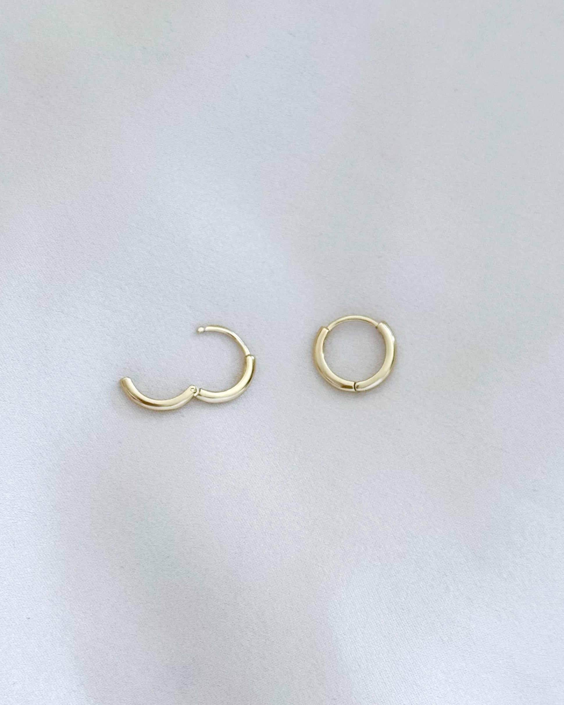 LE sensor earrings Clara Mini Huggies showing open earrings for clamp closure