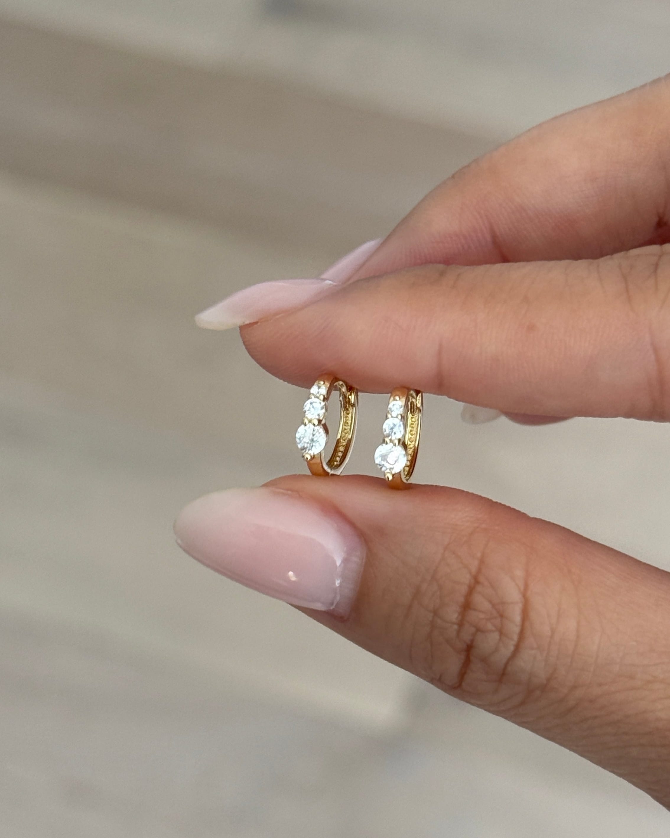 LE sensor earrings Lumen Graduated CZ Huggie Earrings