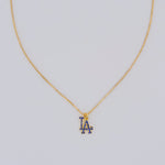14k gold filled LA necklace with blue pavé stones on a dainty box chain, displayed on light gray background