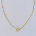 Chana necklace with 17-inch oval link chain and gold round clasp, designed for charms