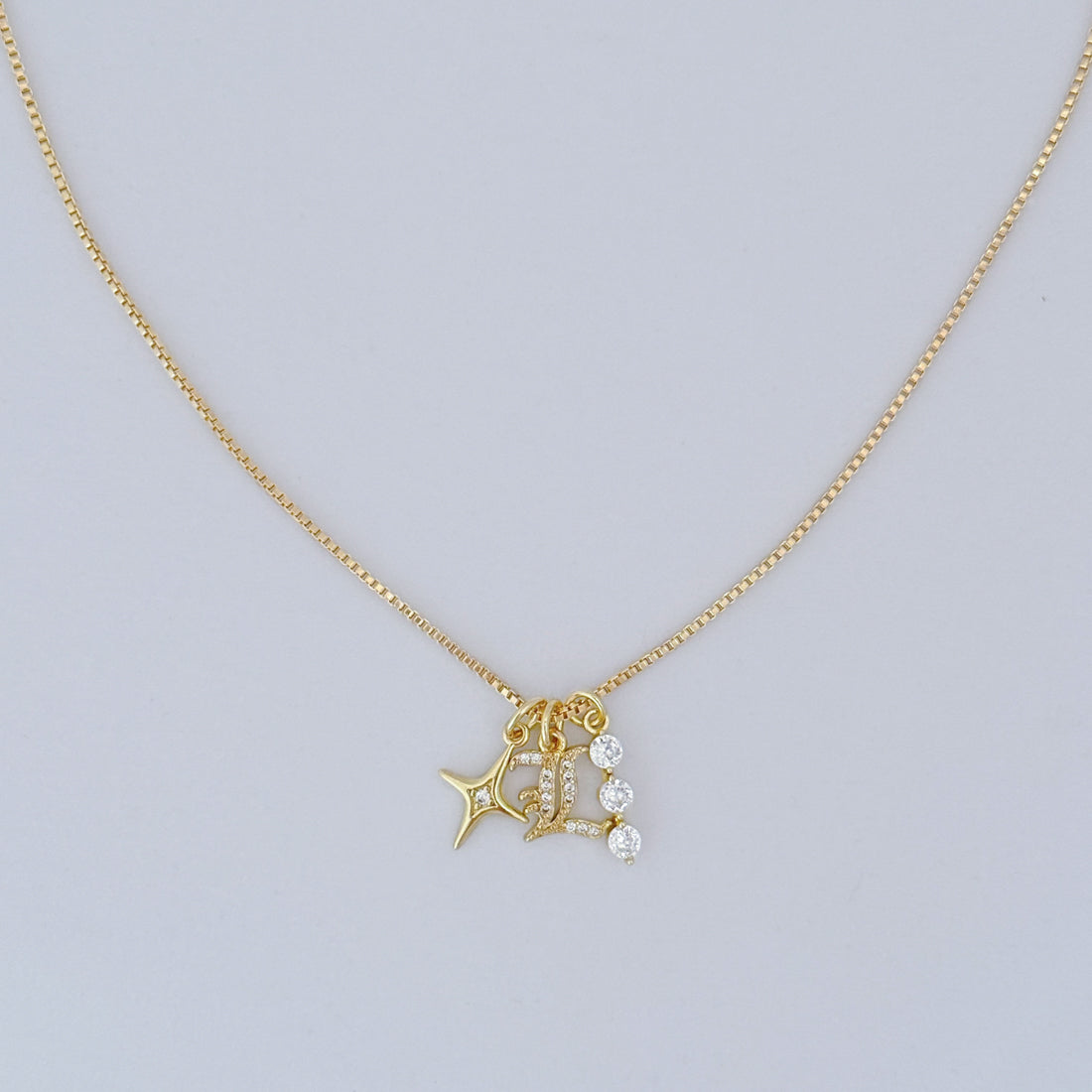 Gold-filled box chain with Old English letter, CZ bar charm, and star accent