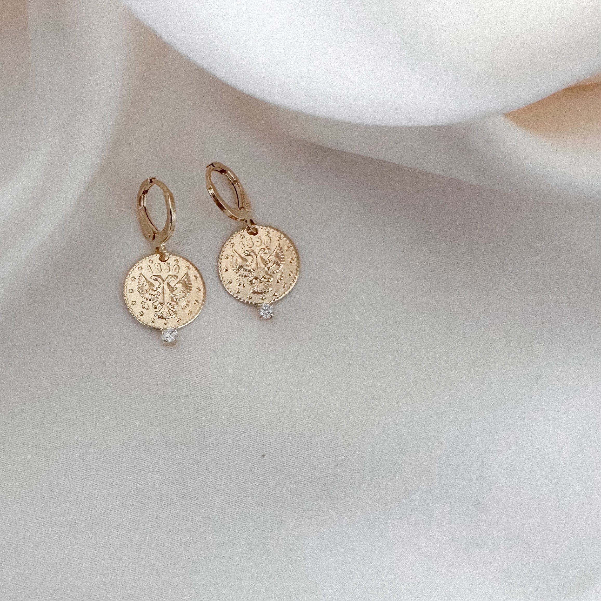 LE sensor earrings Palmer Huggies