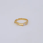 18k gold filled adjustable ring with curved band and clear CZ teardrop and round stones.