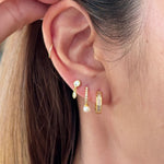 video showing vesper baguette huggies with other earring stacks